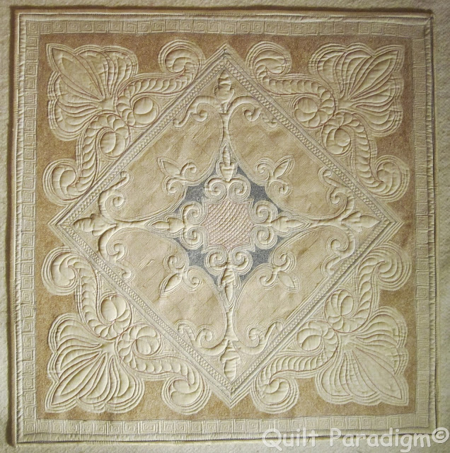 http://quiltparadigm.blogspot.com/2015/01/whole-cloth-heaven.html