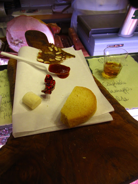 A photo of biscotti, brandy and apricot jam in Siena, Italy. A photo of biscotti, brandy and apricot jam in Siena, Italy.