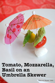 Tomato Mozzarella Basil on Cocktail Umbrella Skewers