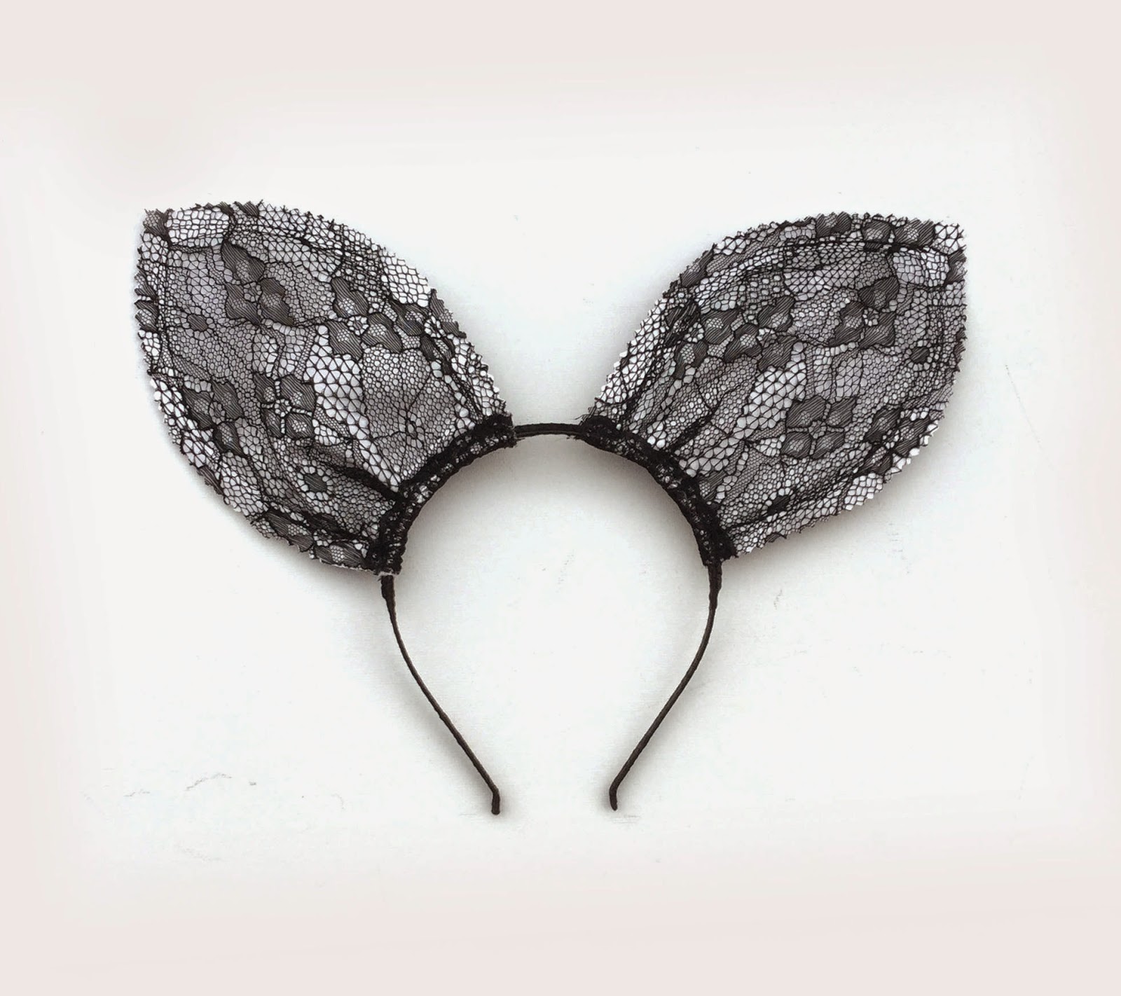 https://www.etsy.com/uk/listing/221705786/black-lace-and-ivory-silk-bunny-ears?ref=shop_home_active_23