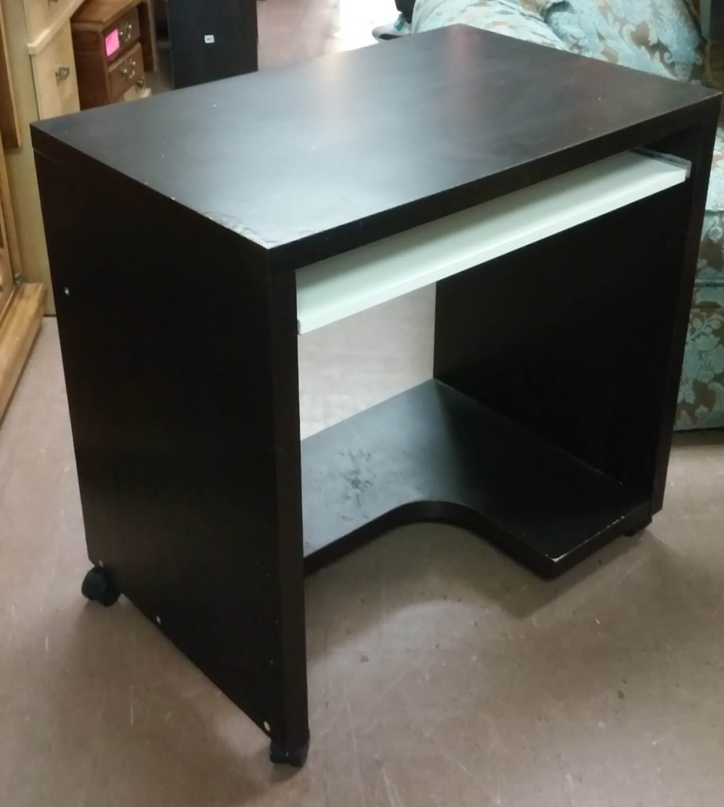 UHURU FURNITURE & COLLECTIBLES SOLD Ikea Desk on Wheels 25