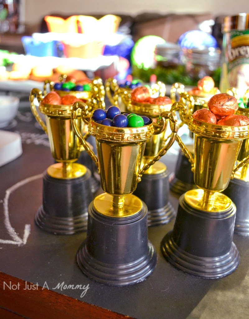 Easy Super Bowl party ideas; toy trophies as candy bowls