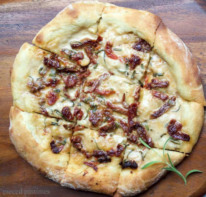 Pieced Pastimes White Pizza with Garlic Coconut Sauce and Sundried