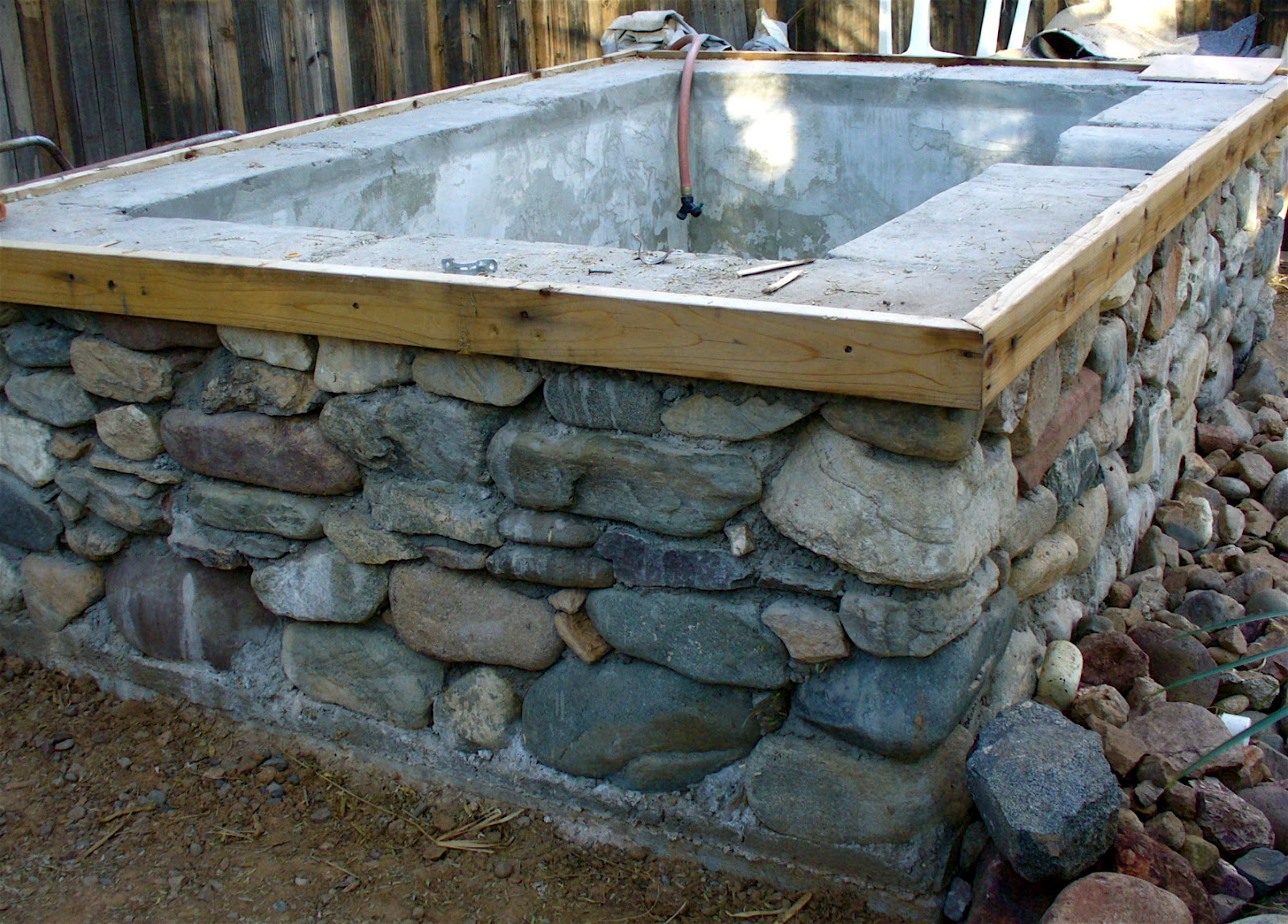 Concrete and stone hot tub | Patio ideas | Pinterest