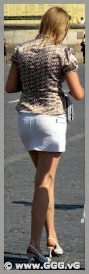 Girl in summer skirt on the street