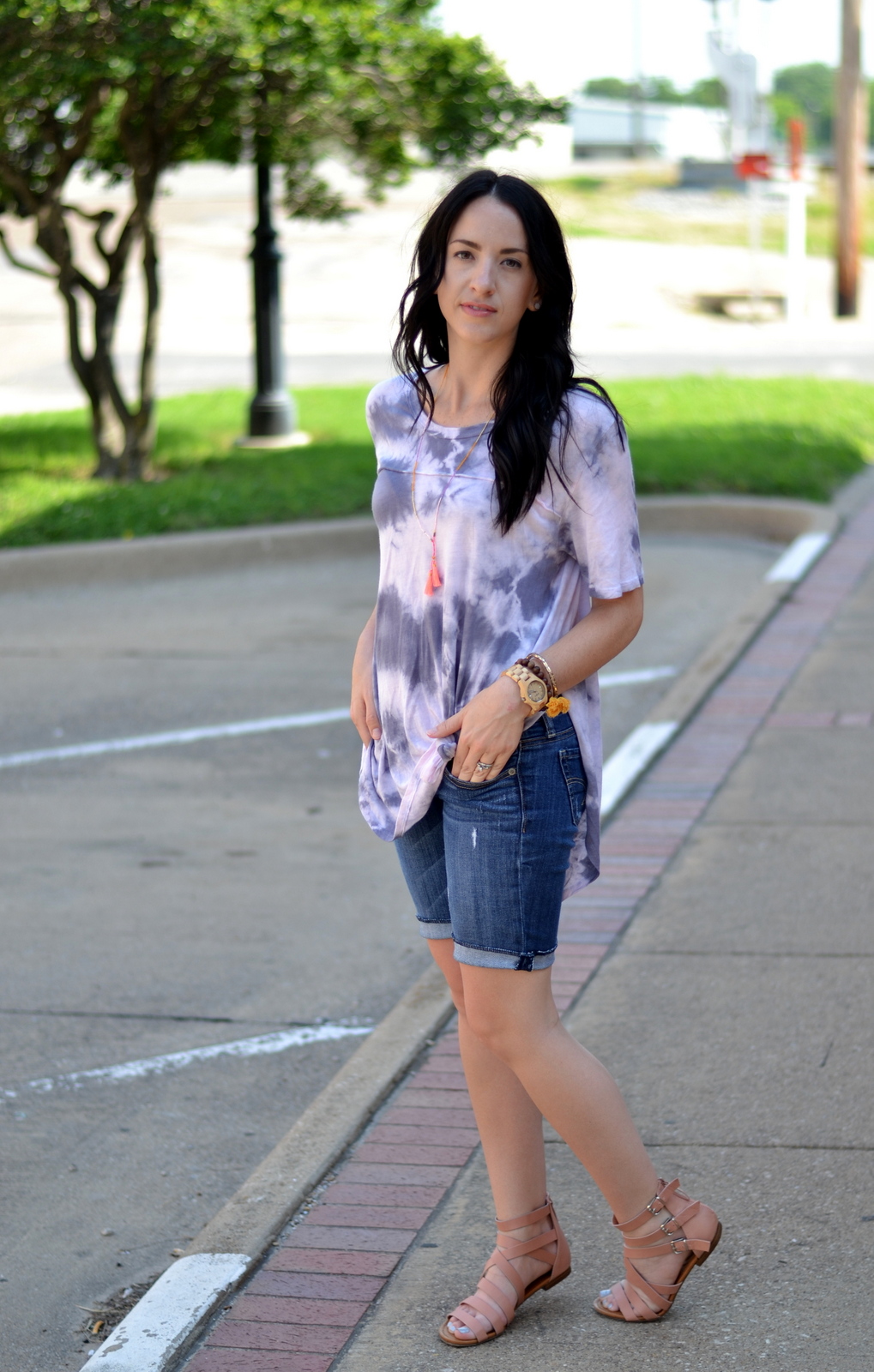 knotted tie dye t shirt, shorts and gladiator sandals