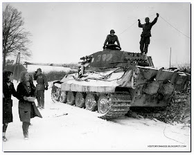 American soldiers inspect  German Tiger tank  Belgian village  Corenne February 1945