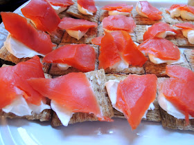 Cream cheese and salmon on triscuits