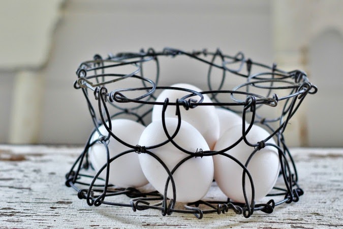 Antique Market Basket, Egg Basket, Milk Strainer Light, Flower Frogs, Tarnished Trays, Treadle Sewing Machine Wheel and Rusty Springs via http://knickoftimeinteriors.blogspot.com