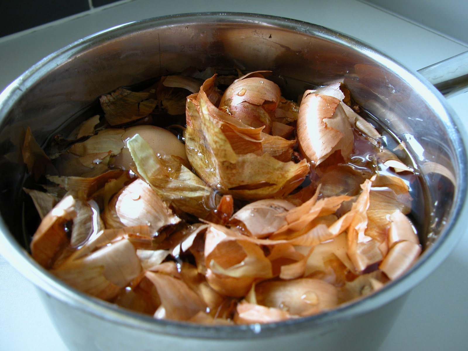 happy to make How to decorate Easter Eggs using wax and onion skins