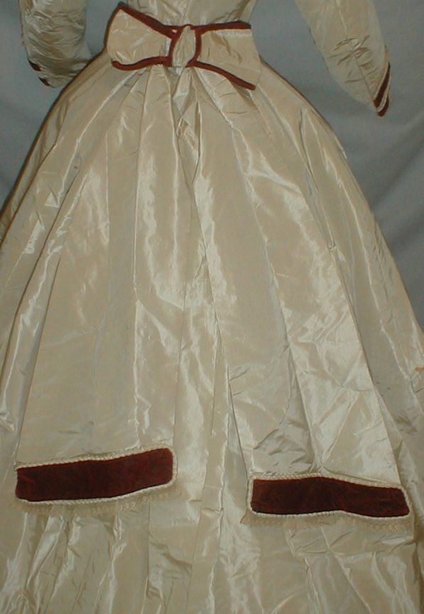 All The Pretty Dresses 1865 Ivory Dress with Red Velvet Trim