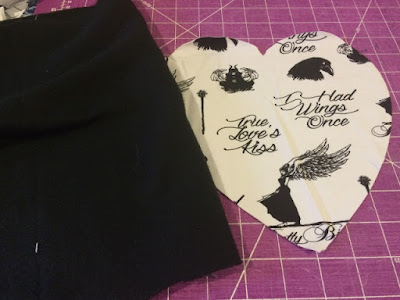 Cutting fabric to size. Cutting fabric to size.