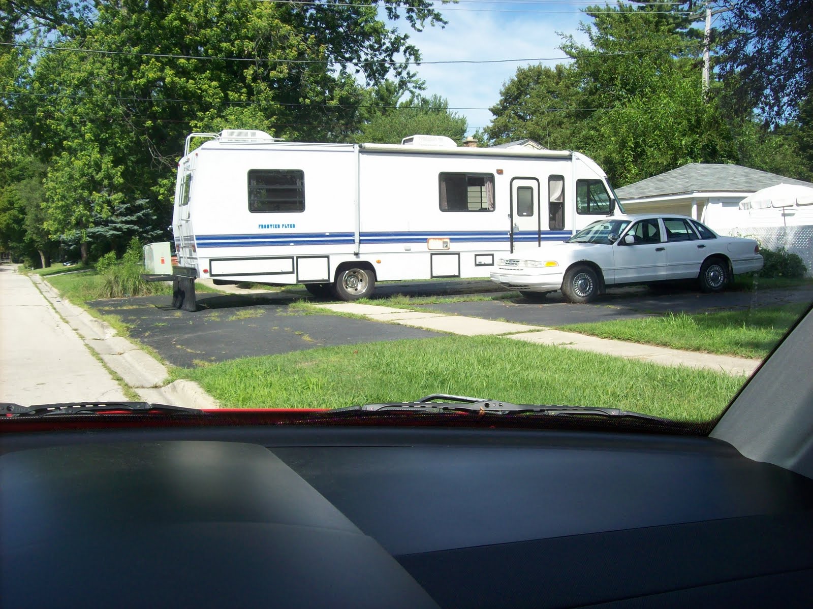 Woodstock Advocate Cars blocking sidewalks?