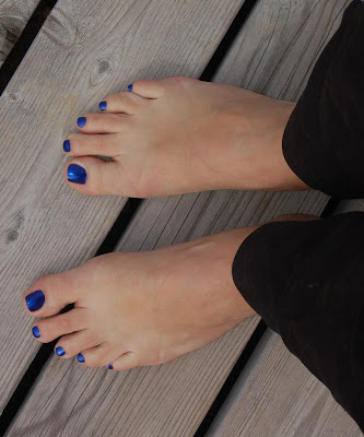 blue nail polish on my toes with jogging pants blue nail varnish, polish on a mans toes