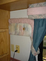 The old bed header becomes padding for guitar cases