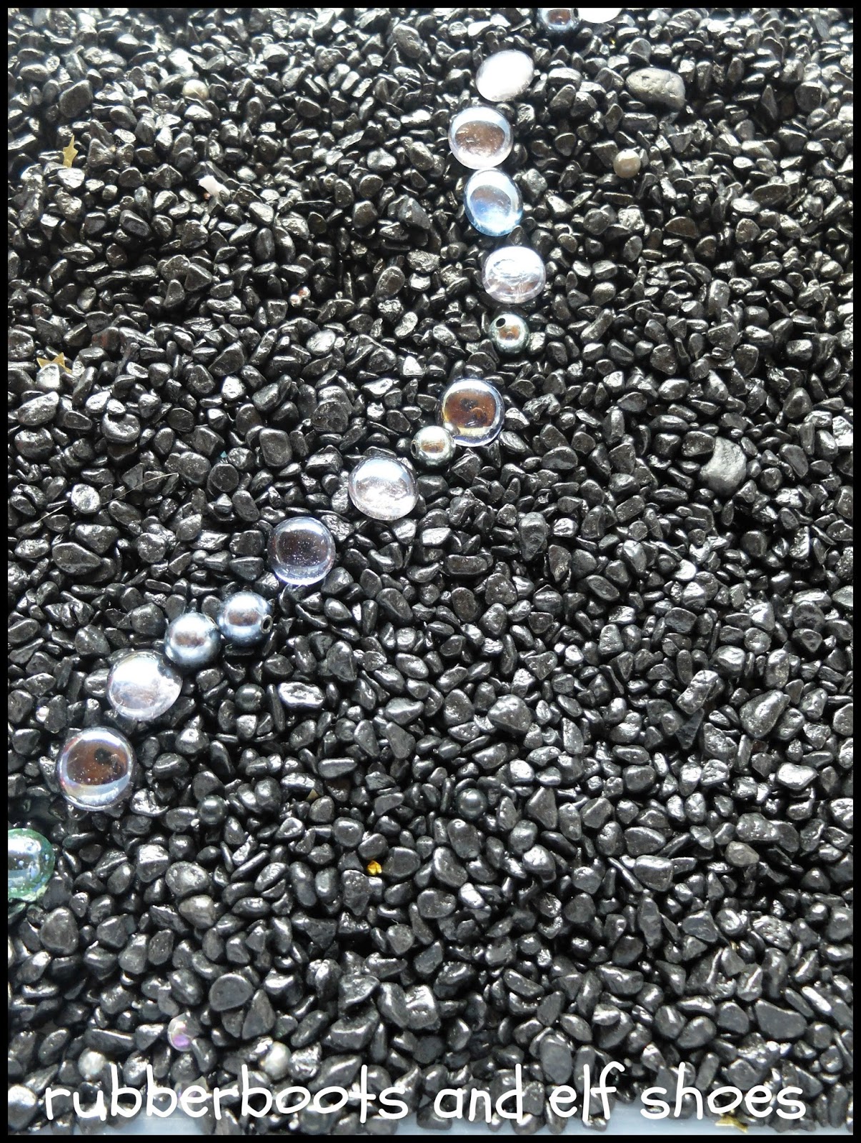 sensory bin filler aquarium gravel rubber boots and elf shoes