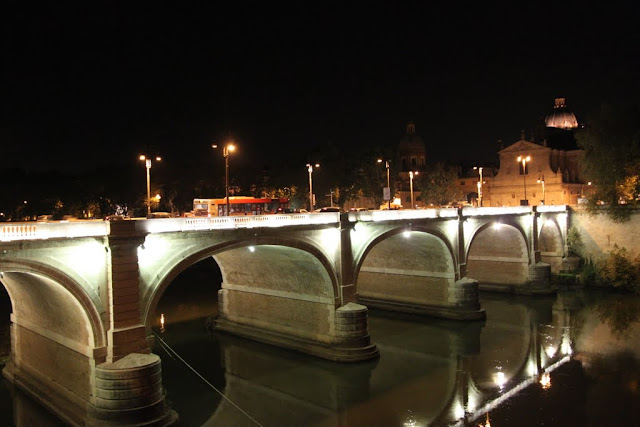 The night view of a bridge in the city of Rome, Italy The night view of a bridge in the city of Rome, Italy