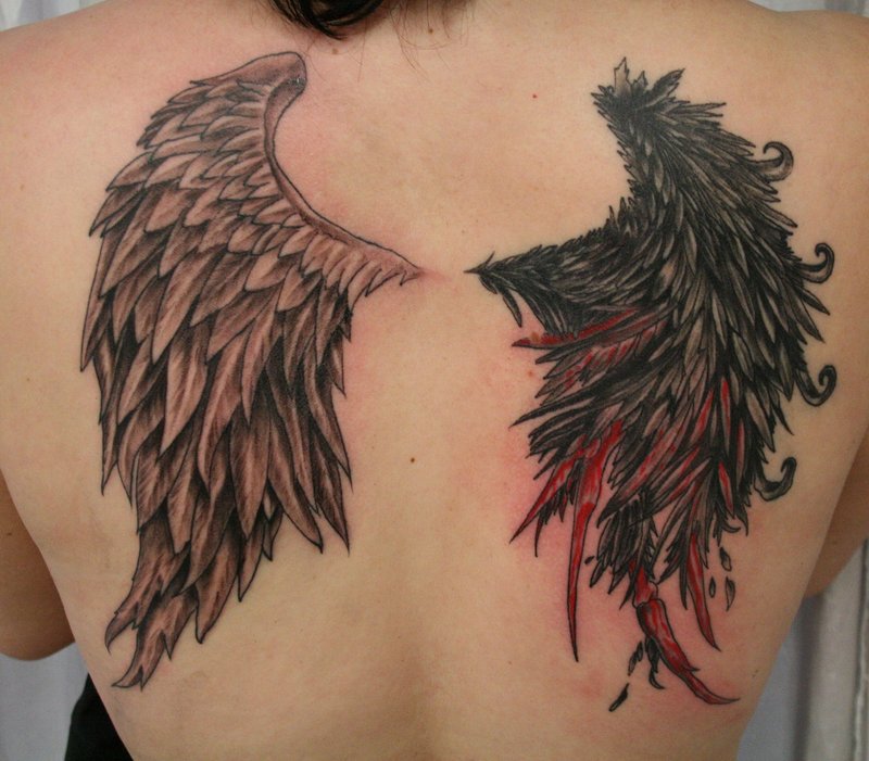 wing tattoos on back for girls. wings tattoo men