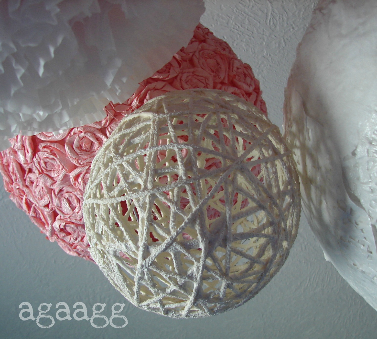 A girl and a glue gun balloon, some yarn, and a hot mess..