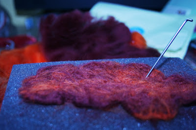 Needle felting kit a picture of a needle felted leaf with the needle and foam block