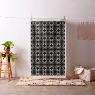 Susan Golis http://www.zazzle.com/black_and_white_geometric_print_fabric-256144651016439684?rf=238418686999709759