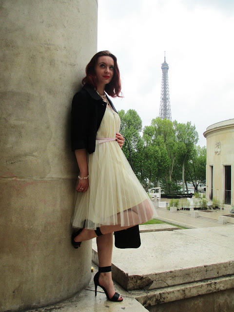 Palais de Tokyo Chanel skirt dress cropped jacket pearls Eiffel Tower