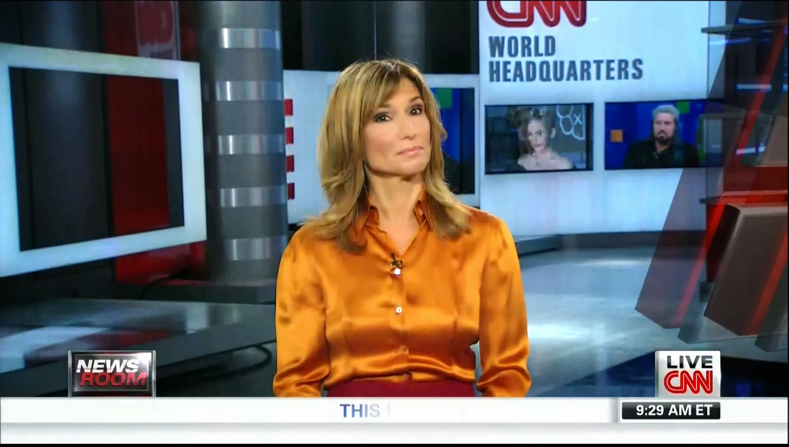 Ladies in Satin Blouses: Carol Costello - orange satin blouse