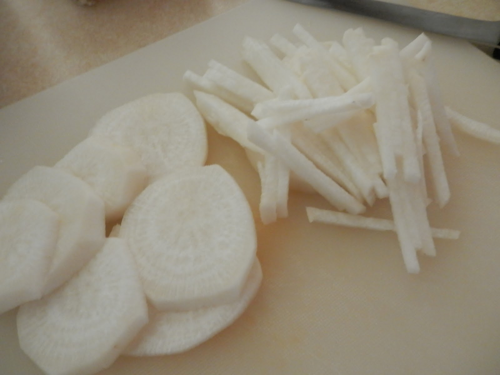 Dosanko in the South Daikon Radish and Cucumber Salad with Yuzu Dressing