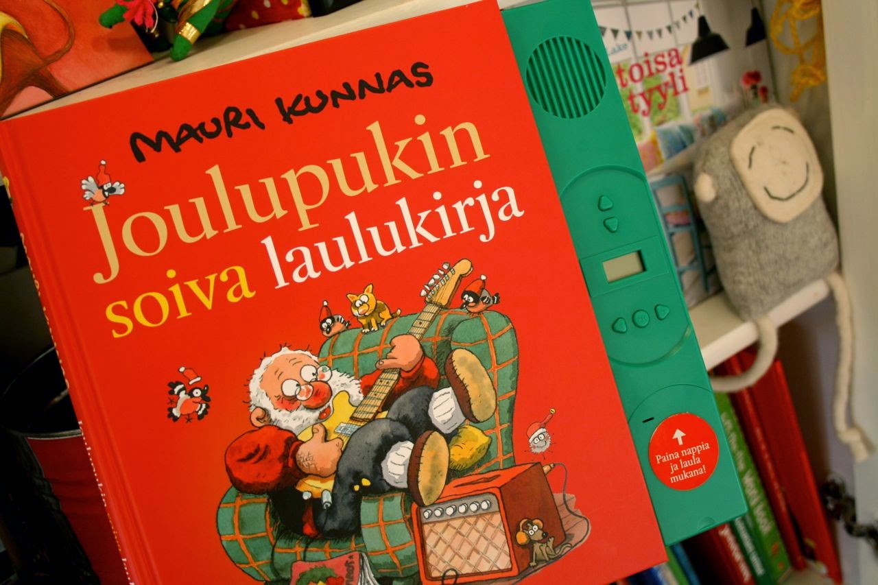 Värikäs päivä Lastenkirjablogi: Meidän jouluajan hitti: Joulupukin soiva  laulukirja