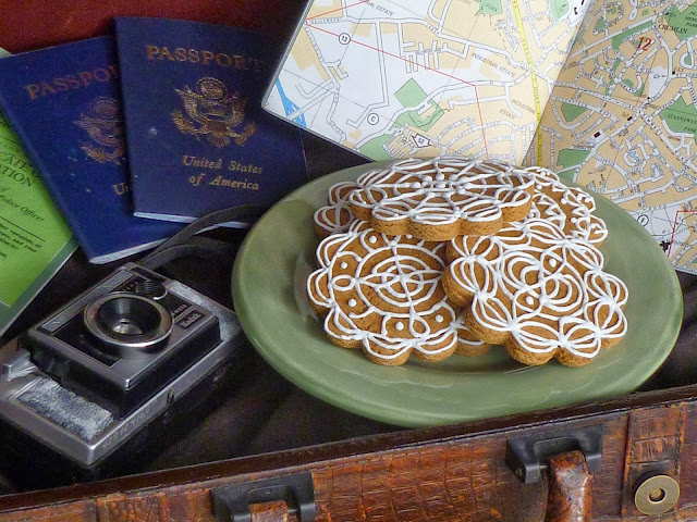 beautiful gingerbread cookies, maps, passports, and camera