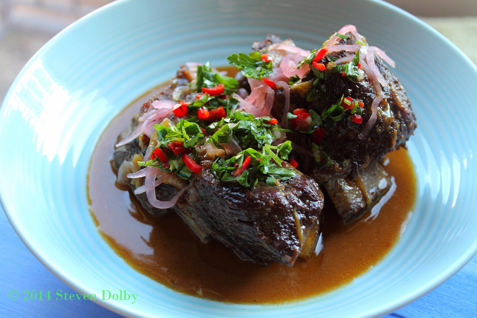Slow cooked Beef Short Ribs with Pickled onions and Chili Gremolata by