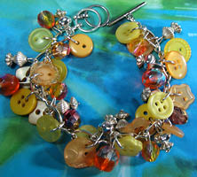 Lucky Charm Bracelet Charm Bracelet has Clusters of Beads and Buttons in Sunshine Yellow with Silver Pewter Charms