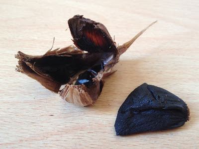 black garlic clove and skin