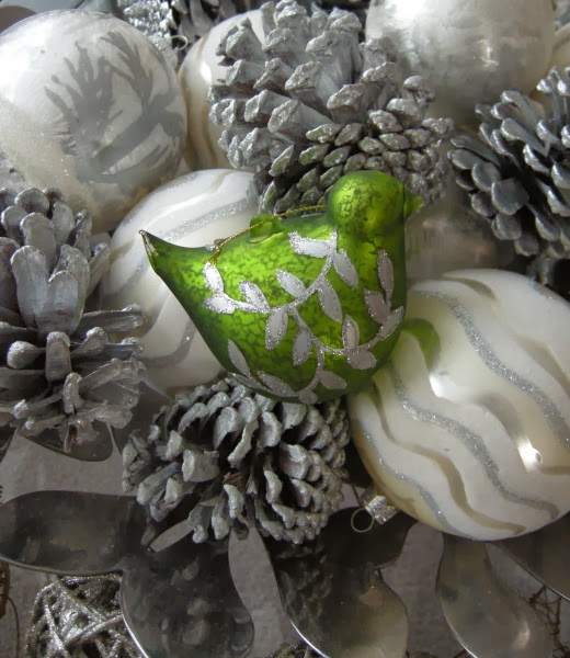 A nature inspired Christmas silver pinecones ornaments birds simple Christmas decorations
