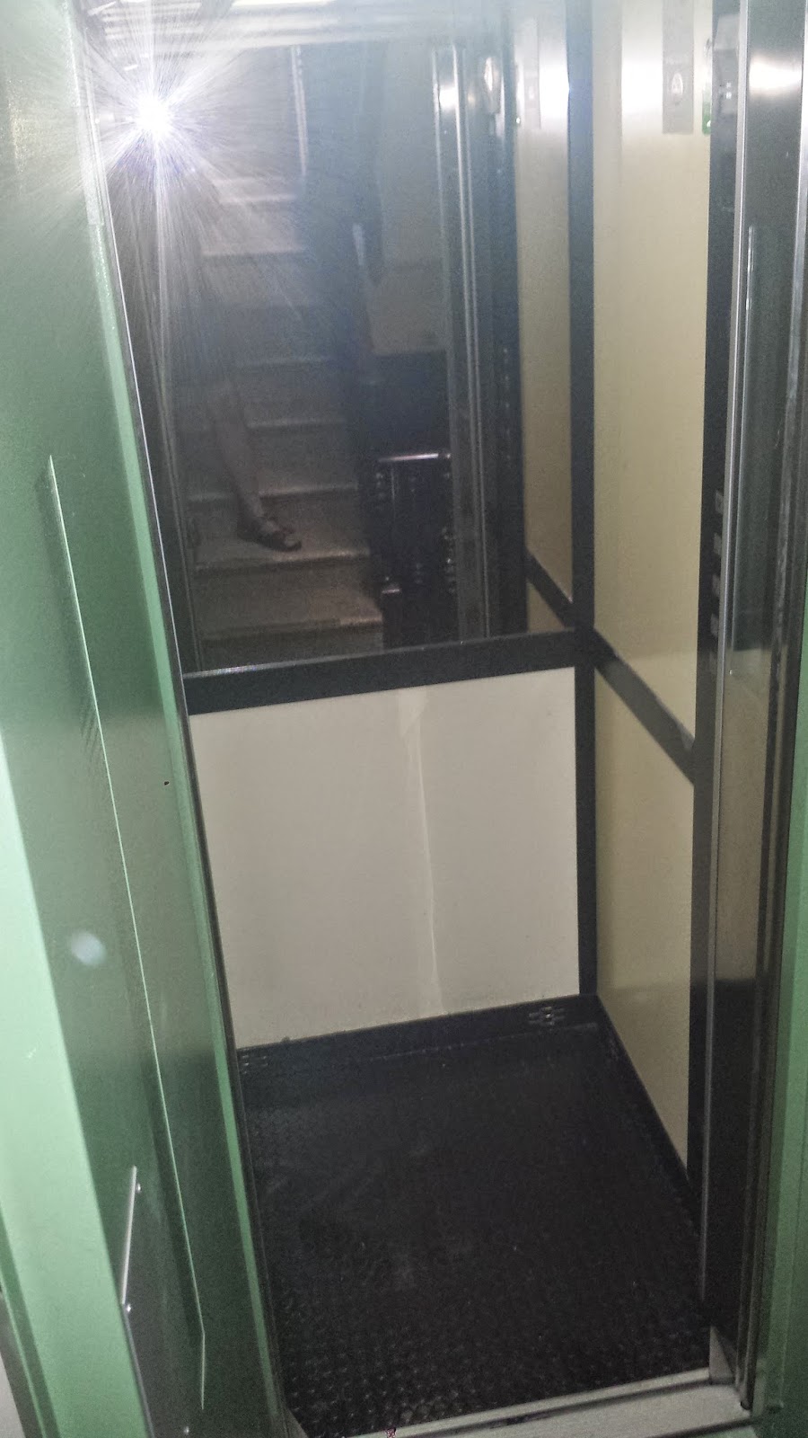 An American in Barcelona Progress in the Home, Broken Elevator, and