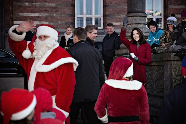 Crown Princess Mary of Denmark leads the lighting of Christmas tree in the 100th year of the tree lighting ceremony at Copenhagen City Hall Square (Rådhuspladsen) in Copenhagen