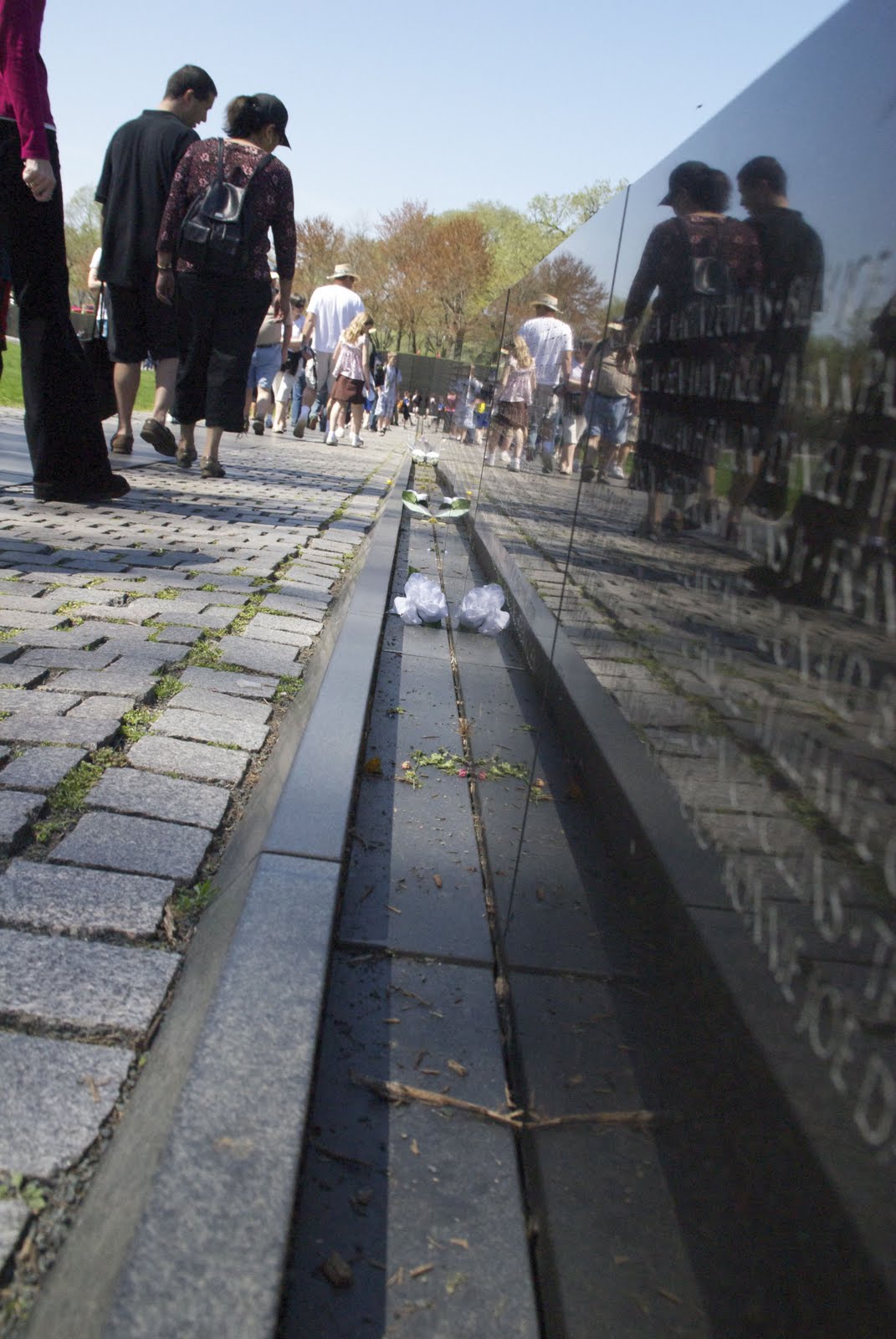 designed by american architect maya lin who was a student at yale when her design was chosen the wall has become an iconic part of the mall in dc