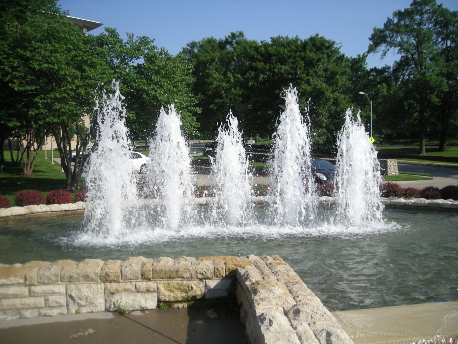 Cutting Coupons in KC Kansas City Tour of Fountains Surrounding Plaza