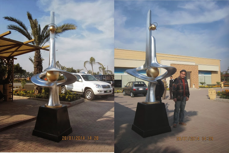 A BEAUTIFUL STEEL LOOK MONUMENT IN FIBER GLASS.