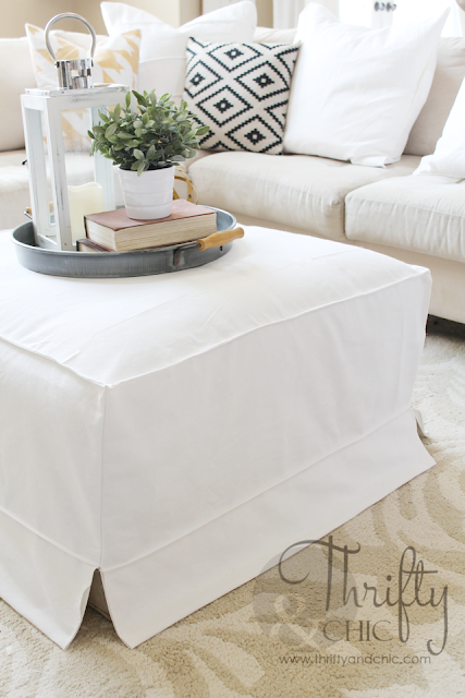How to make a slipcover for an ottoman or coffee table. Great way to get that cute Ikea slipcover look!