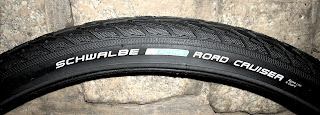 Schwalbe Road Cruiser 26x1.75 bicycle tire Side view of Schwalbe Road Cruiser 26x1.75 bicycle tire showing manufacturer logos and text