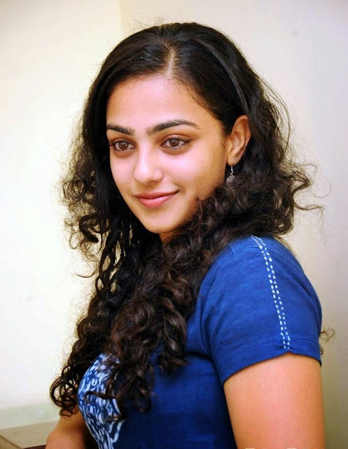 Nithya Menon Spicy Indian Film Actress and Playback Singer very beautiful and hot sexy stills Wallpapers Free Download