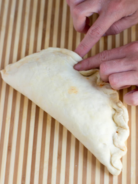 Roasted Tomato and Cheese Calzones ohsweetbasil.com Roasted Tomato and Cheese Calzones ohsweetbasil.com