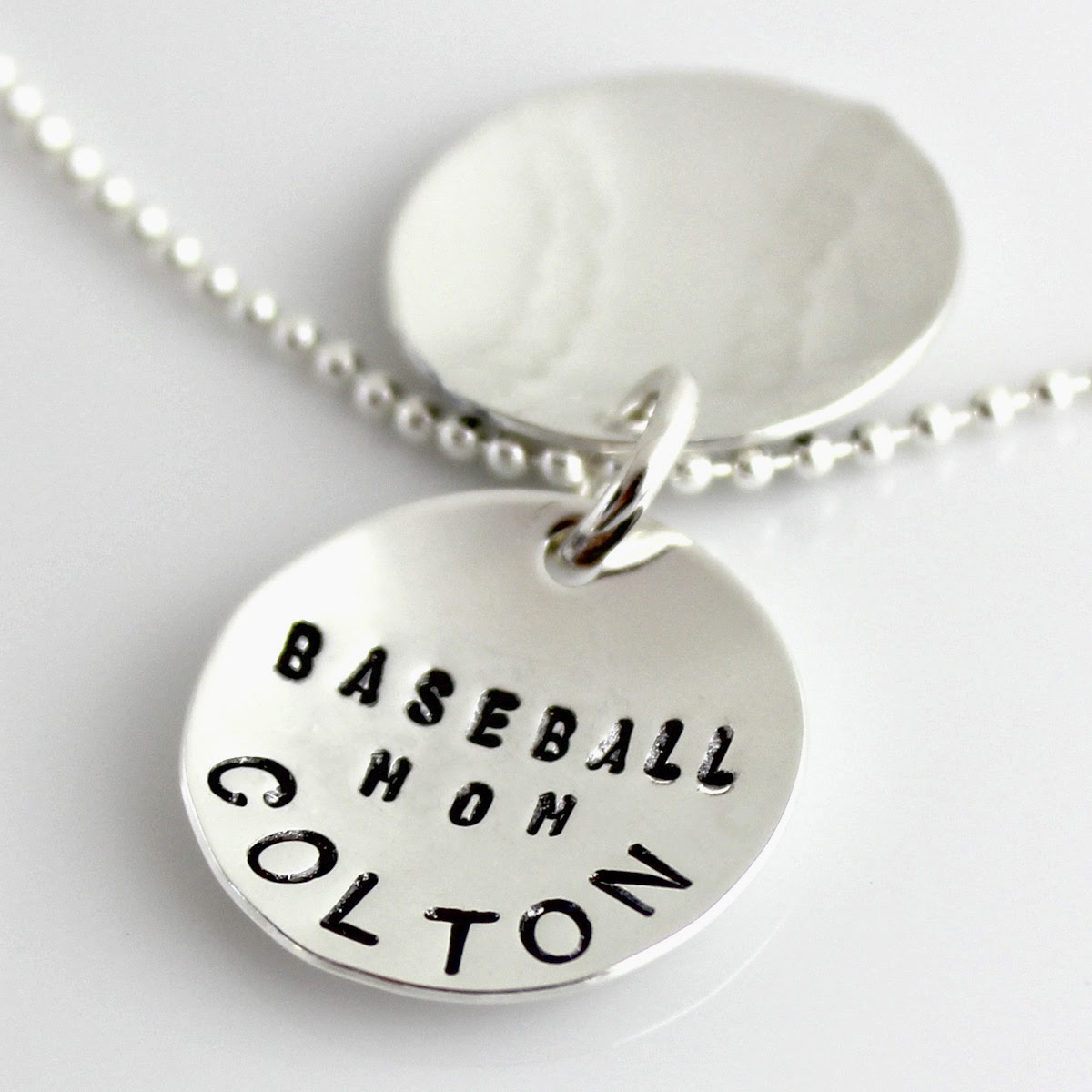 http://shop.punkyjane.com/Baseball-Mom-hand-stamped-and-personalized-faux-locket-4520.htm