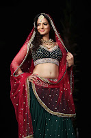 Bollywood and Tollywood acress Amisha, Patel, bridal look, hot sexy, wedding, reception, green choli and lehenga