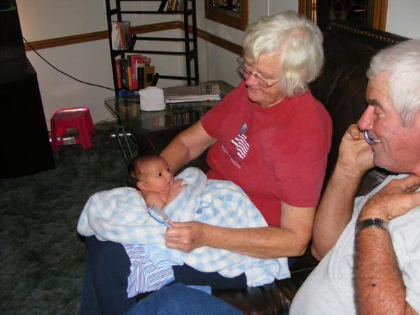 Grandma and Grandpa, Admiring Newborn Caleb