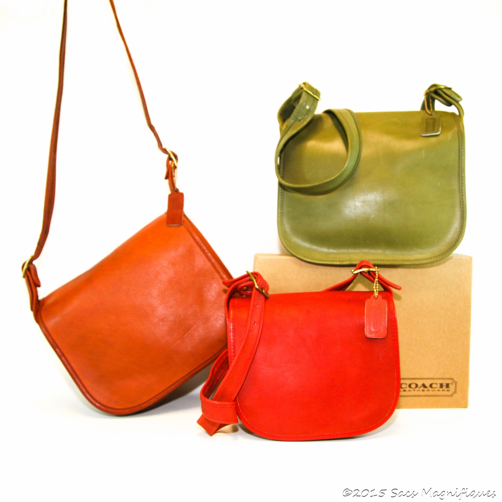 coach wallets saddle