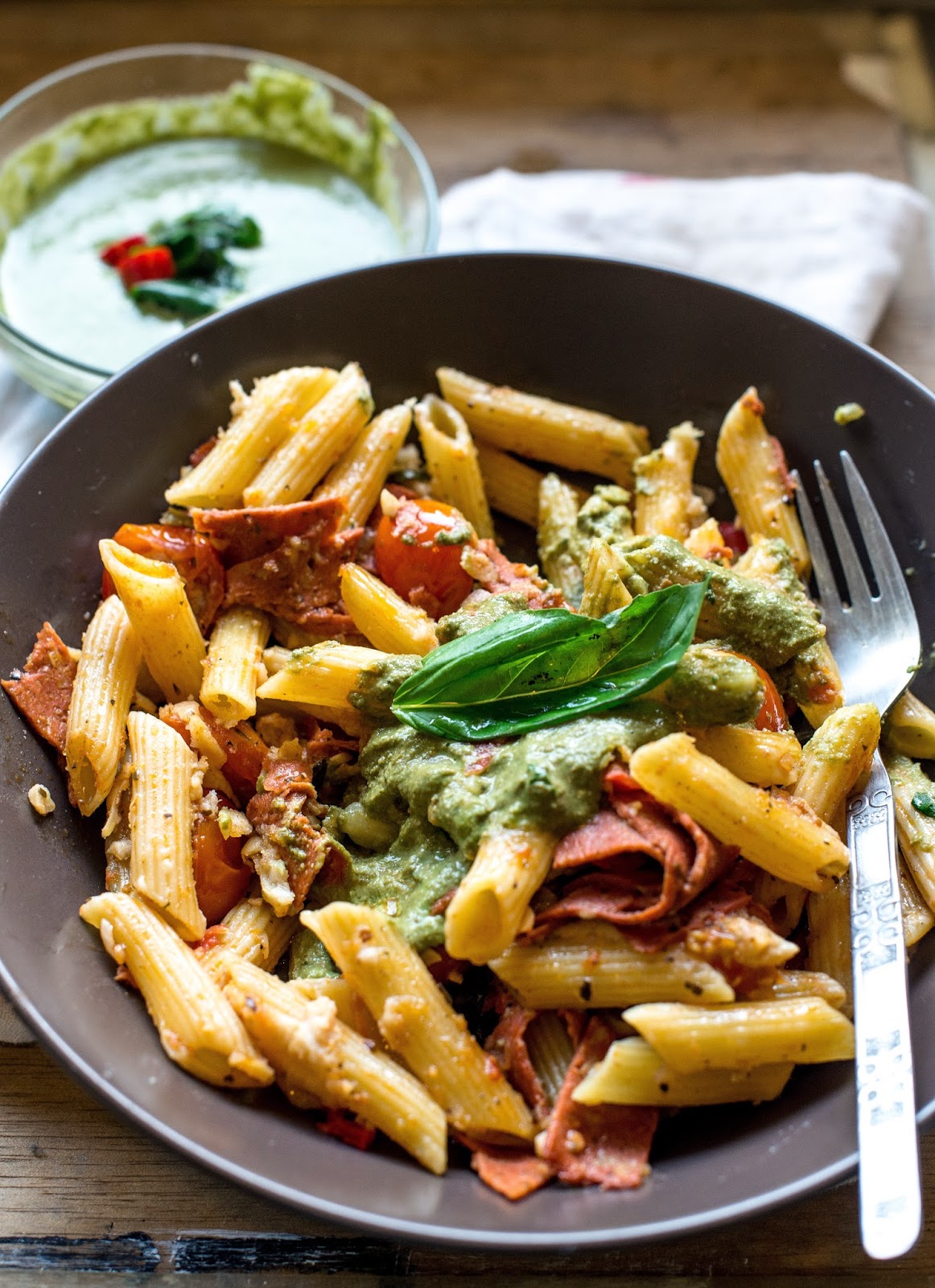 Vegan in Melbourne Vegan salami, tomato, and basil pasta bake.