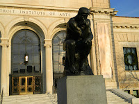 The Thinker by Rodin statue of The Thinker in front of the Detroit Institute of Arts