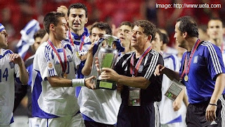 Otto Rehhagel with the Euro 2004 Cup photo